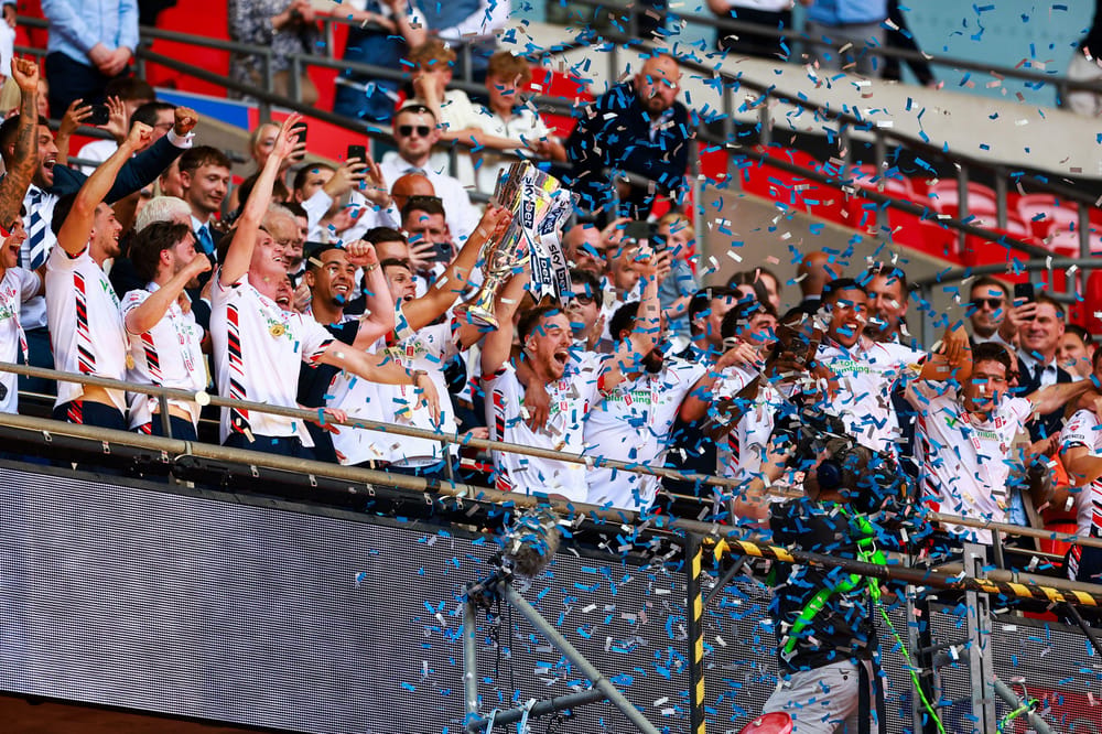 3EHF3NR London, UK. 24th May, 2026. LONDON, ENGLAND - MAY 24: Bolton Wanderers lift the League One playoff final trophy after the Sky Bet League One Play-Off Final match between Bolton Wanderers and Stockport County at Wembley Stadium on May 24, 2026 in London, England. (Photo by Freddie Yeo/MB Media/Getty Images) Credit: MB Media Solutions/Alamy Live News