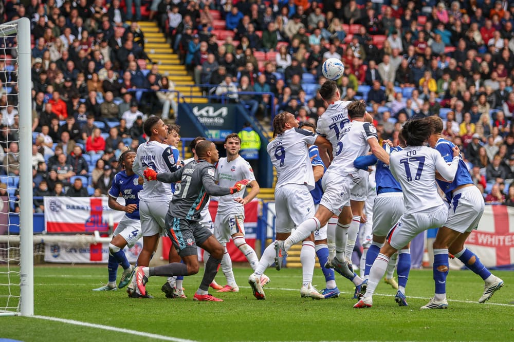 3FGDD8J 12th September 2026; Toughsheet Community Stadium, Bolton, Greater Manchester, England; Championship Football, Bolton Wanderers versus Cardiff City; Eoin Toal of Bolton Wanderers wins a header from a corner