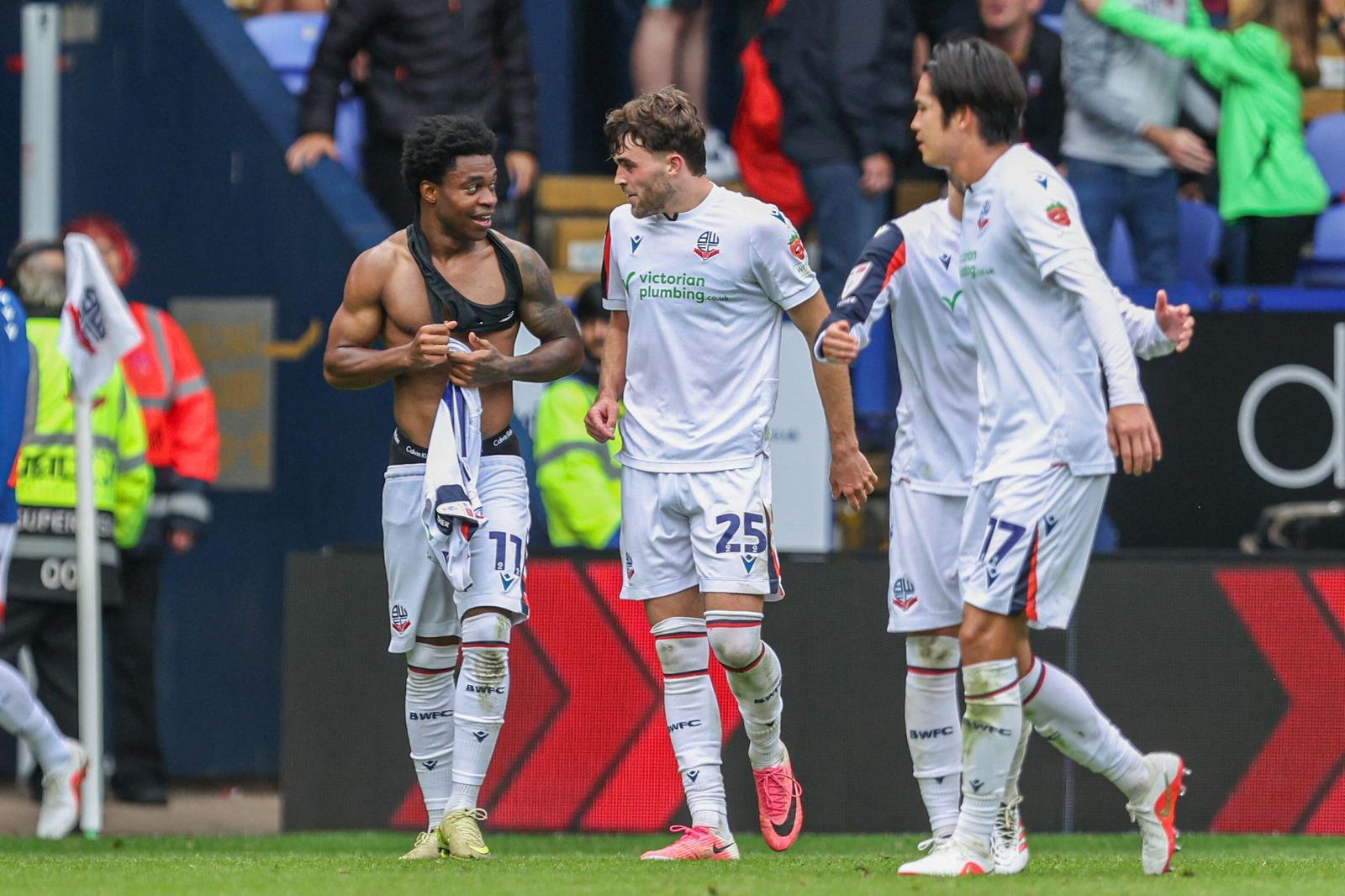 3FGD888 12th September 2026; Toughsheet Community Stadium, Bolton, Greater Manchester, England; Championship Football, Bolton Wanderers versus Cardiff City; Thierry Gale of Bolton Wanderers celebrates with teammates after scoring in the 90th minute to make the score 1-0