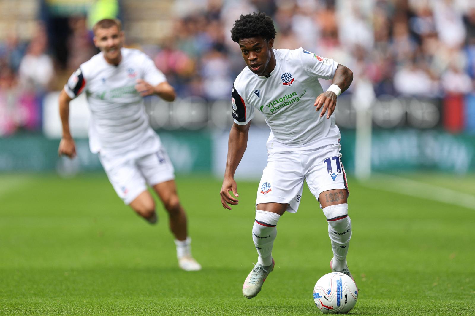 3F9D08N 15th August; Toughsheet Community Stadium, Bolton, Greater Manchester, England; EFL Championship Football, Bolton Wanderers versus Preston North End; Thierry Gale of Bolton Wanderers runs with the ball Credit: Action Plus Sports Images/Alamy Live News