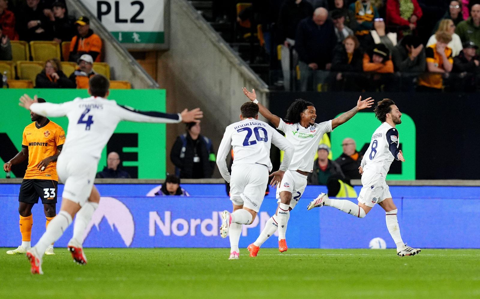 3FT2P8K Bolton Wanderers' Josh Sheehan (right) celebrates after scoring his sides third goal during the Sky Bet Championship match at Molineux Stadium, Wolverhampton. Picture date: Tuesday October 13, 2026.